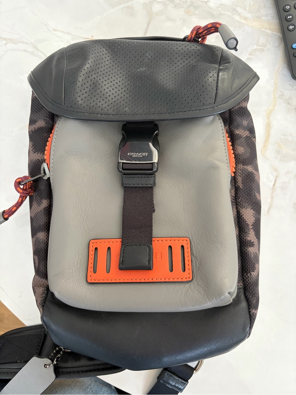 Coach Men's Grey, Black & Orange Sling Bag